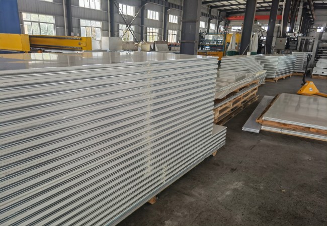 Real cleanroom wall panels staged in factory for modular cleanroom wall system renovation