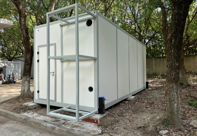 Onsite container laboratory exterior with modular cleanroom wall panels service frame and cleanroom access door