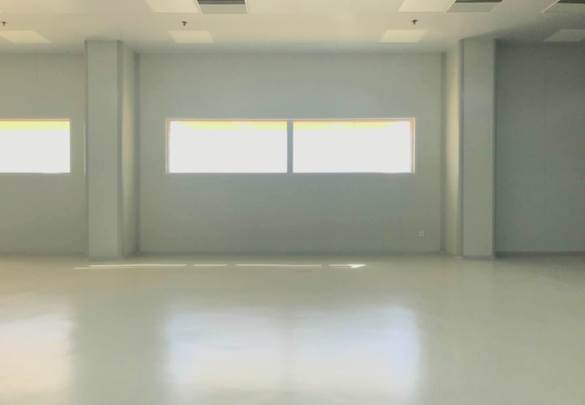 Wonclean real project photo of cleanroom wall panels, ceiling lights and sealed floor in an open clean zone
